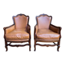 Paire de fauteuils bergères anglaises en cuir havane