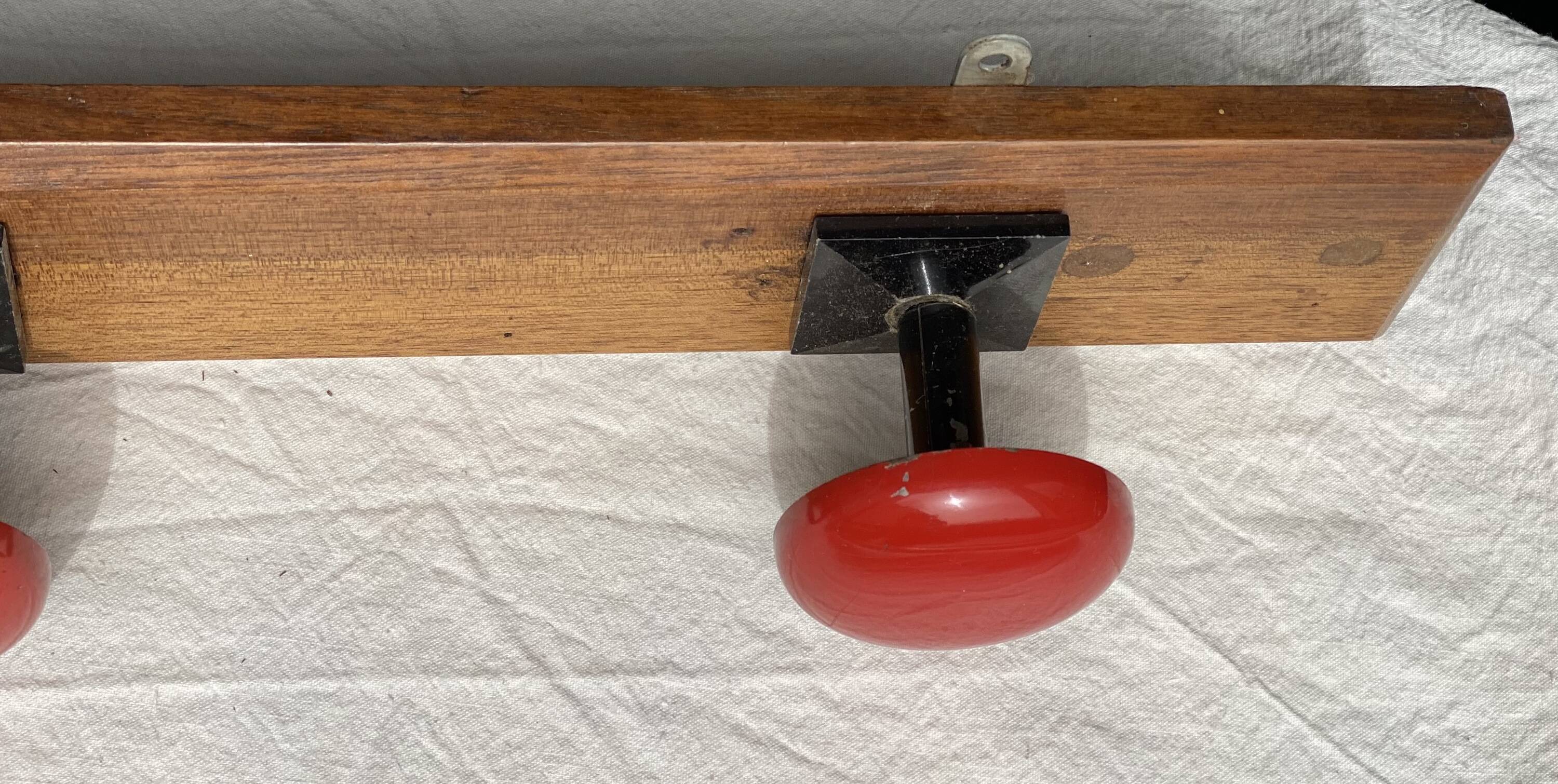 Wall-mounted coat rack with 3 hooks, vintage 1960s red lacquered metal.