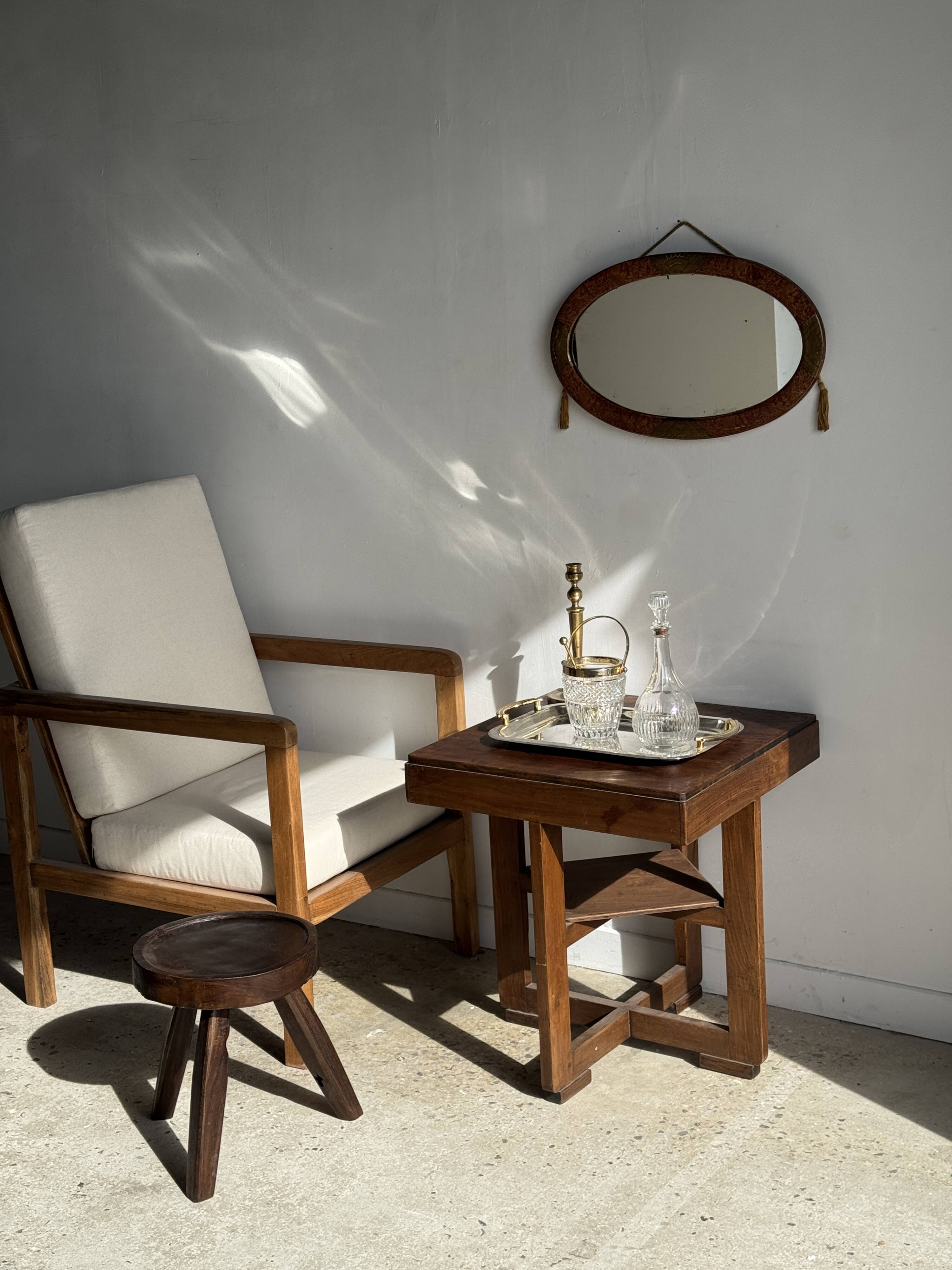 Small oval Art Deco mirror in brown and gold 33x54.