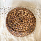 Old bread pan, in woven straw