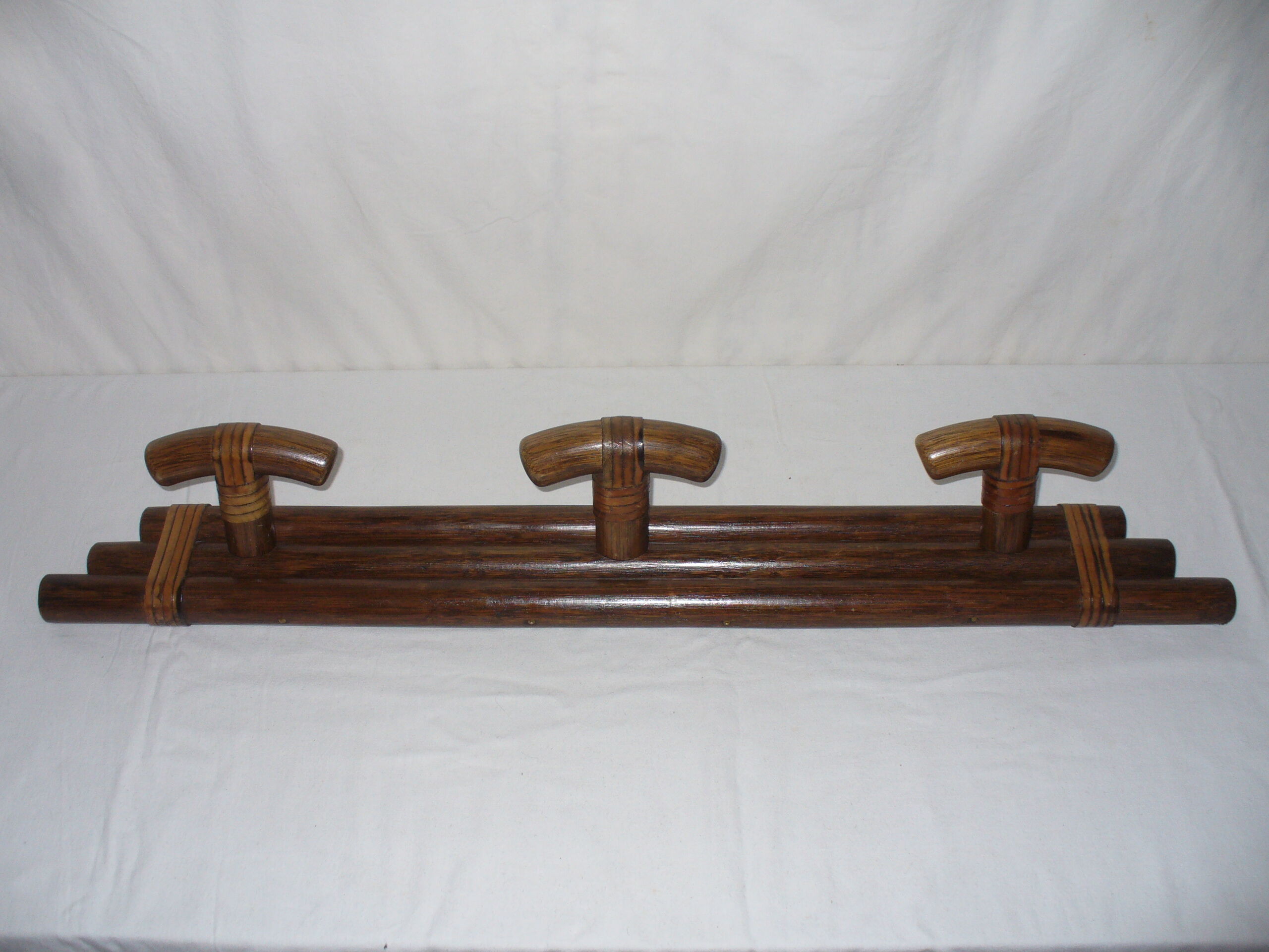 Leather and wood coat hanger
