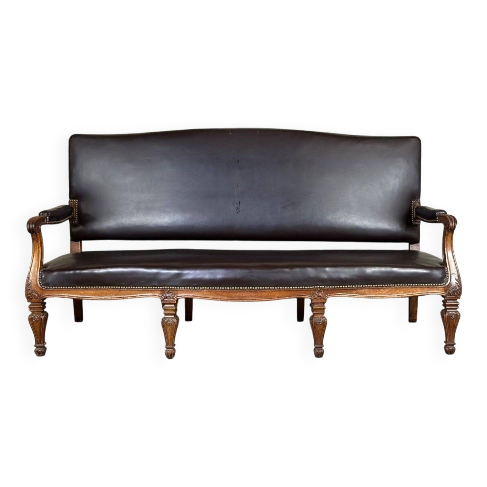 Napoleon III style bench in carved walnut, synthetic leather circa 1880