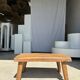 Coffee table in blond teak quadripod
