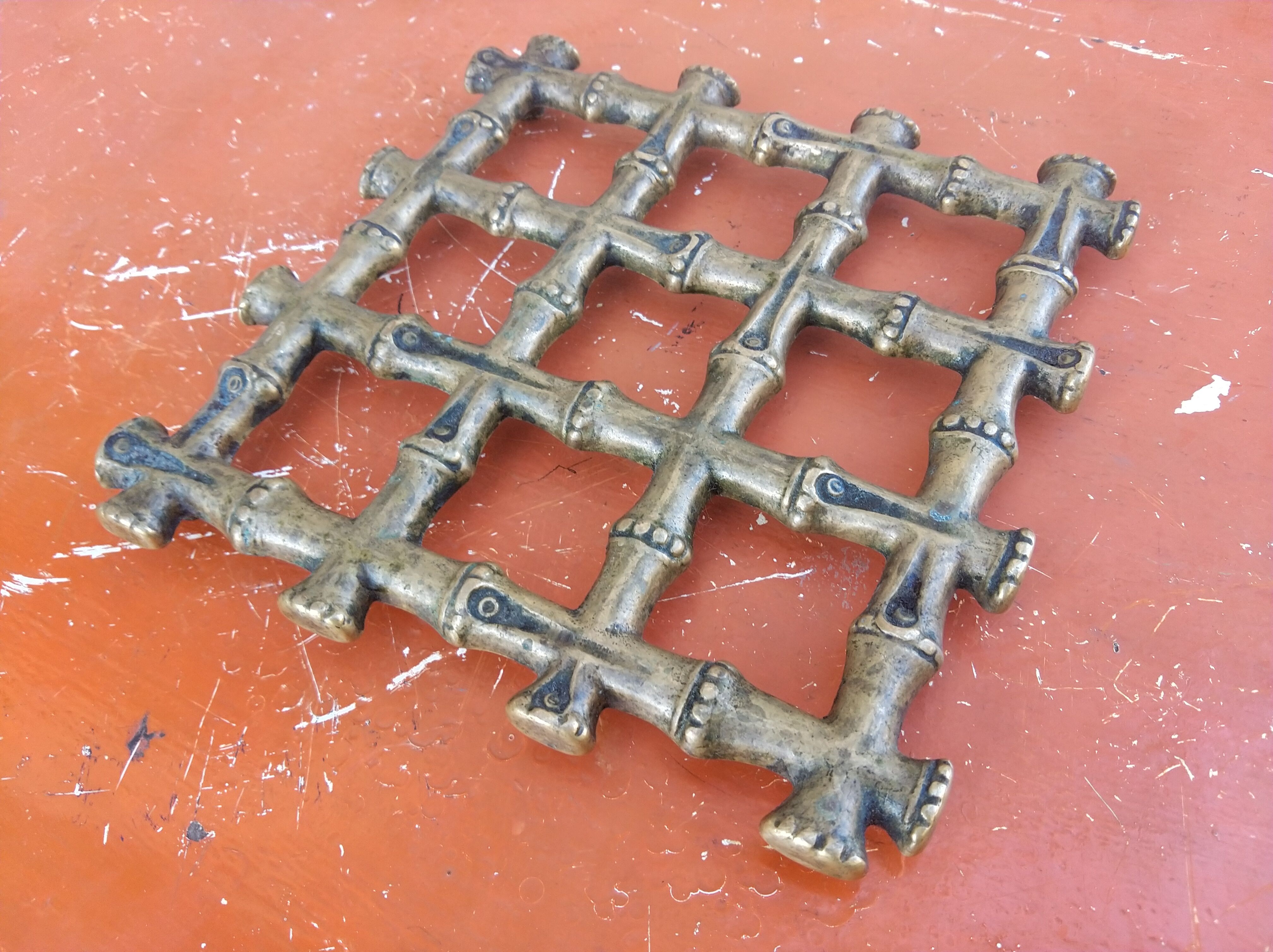 Bronze trivet in the style of bamboo, circa 1960