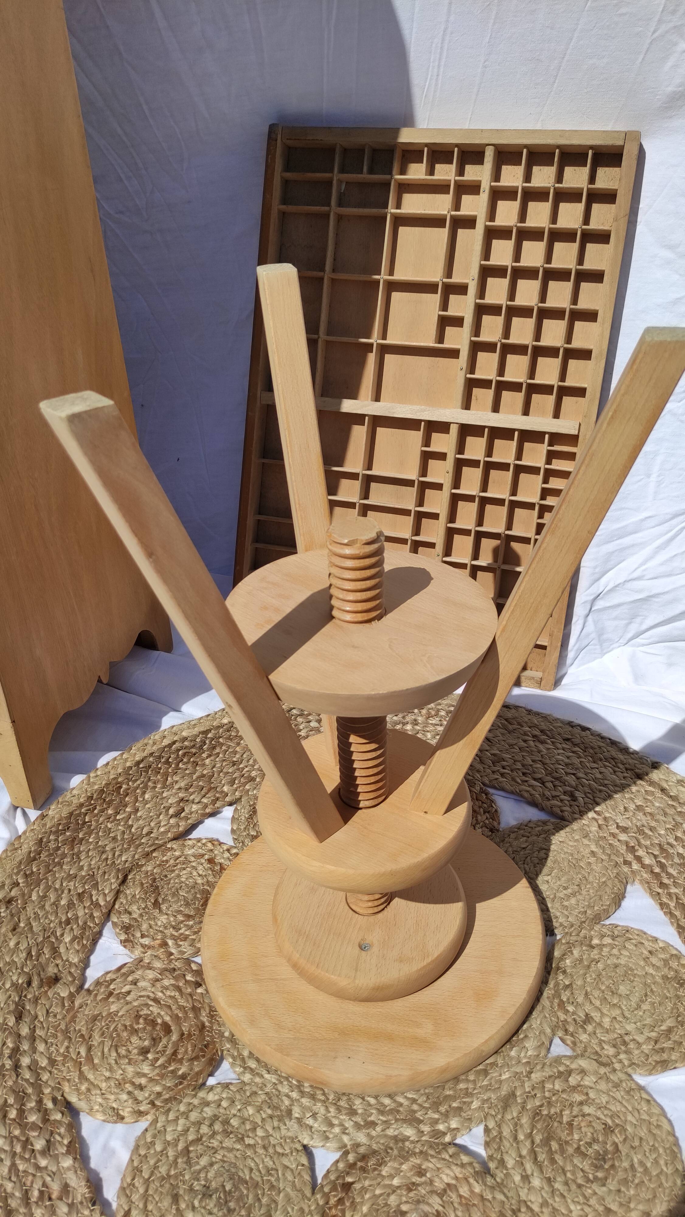 Vintage wooden stool with screws