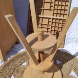 Vintage wooden stool with screws