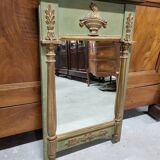 Empire style mirror in wood and gilding