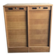 Mid-century industrial haberdashery cabinet in brown oak, double tambour, 1950s.