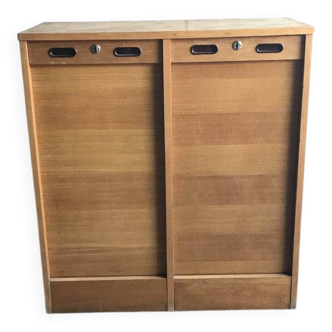 Mid-century industrial haberdashery cabinet in brown oak, double tambour, 1950s.