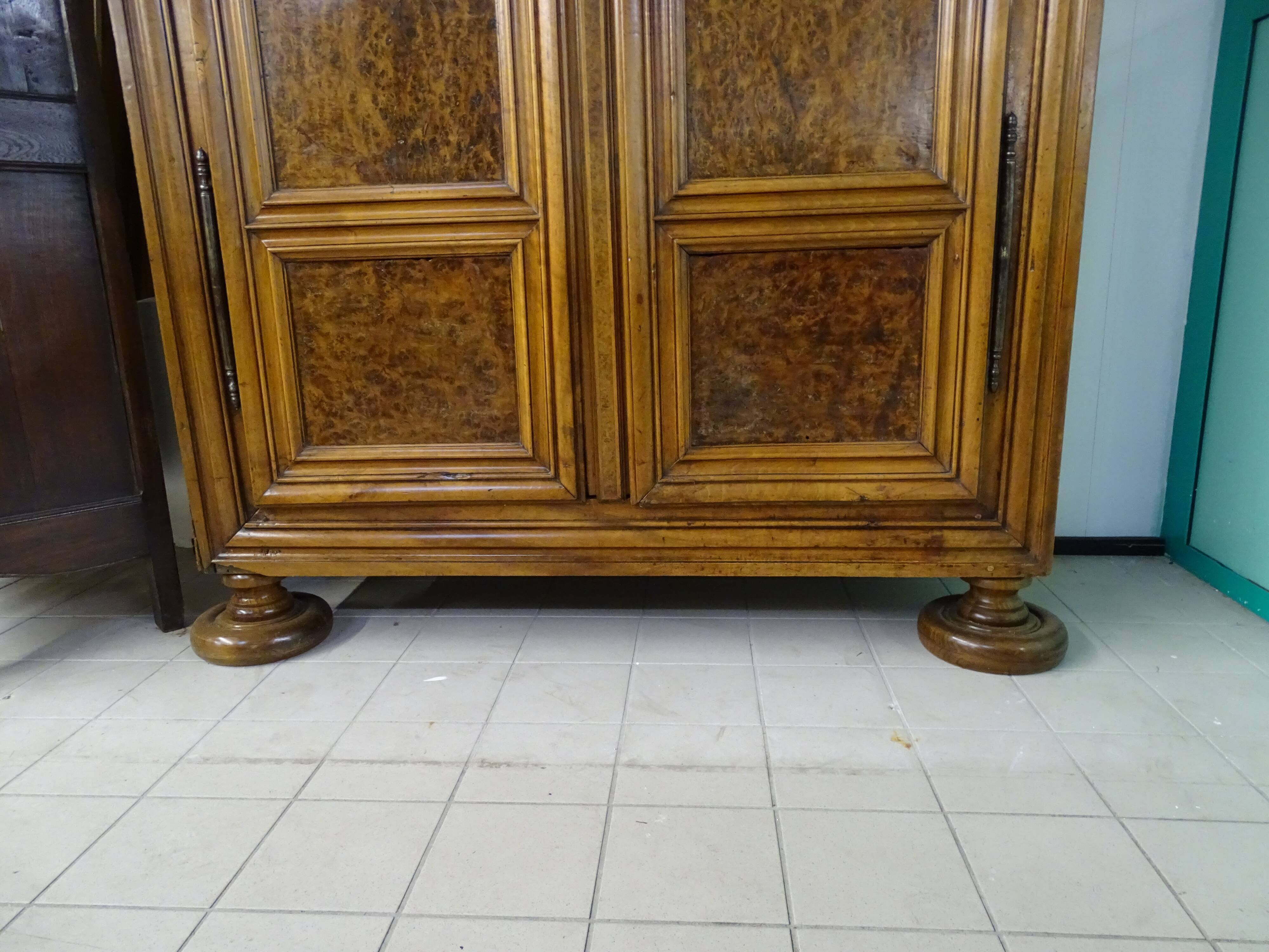 Walnut cabinet and ash magnifying glass