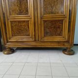 Walnut cabinet and ash magnifying glass