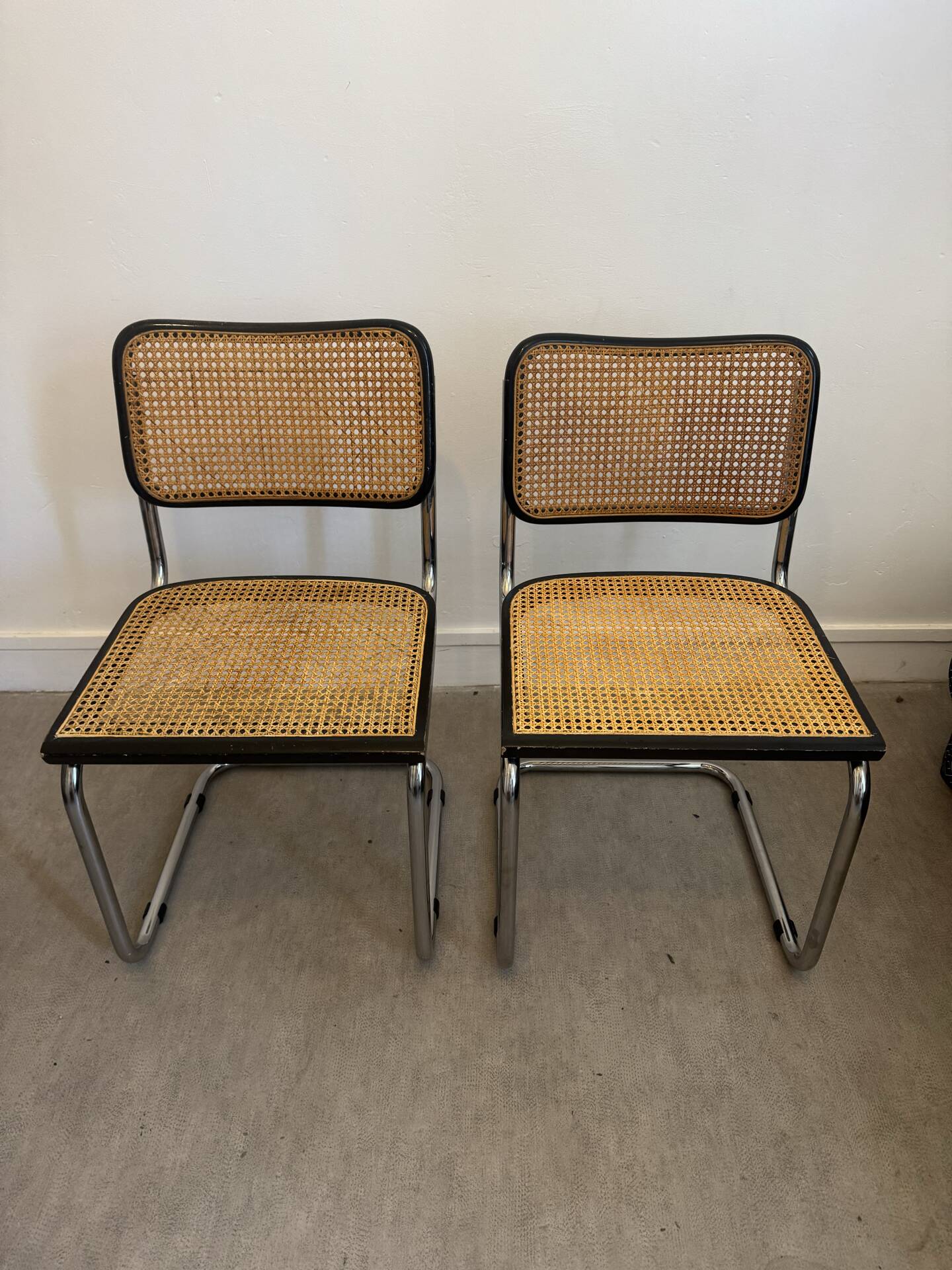 Pair of black Cesca chairs by Marcel Breuer