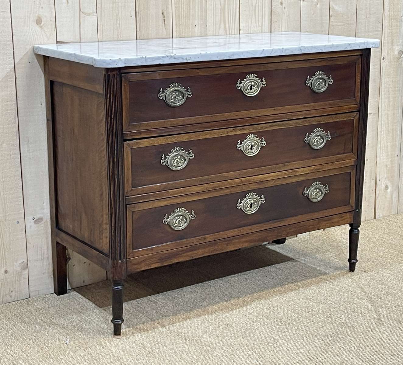 Louis XVI XIXth chest of drawers in mahogany and walnut and white marble top
