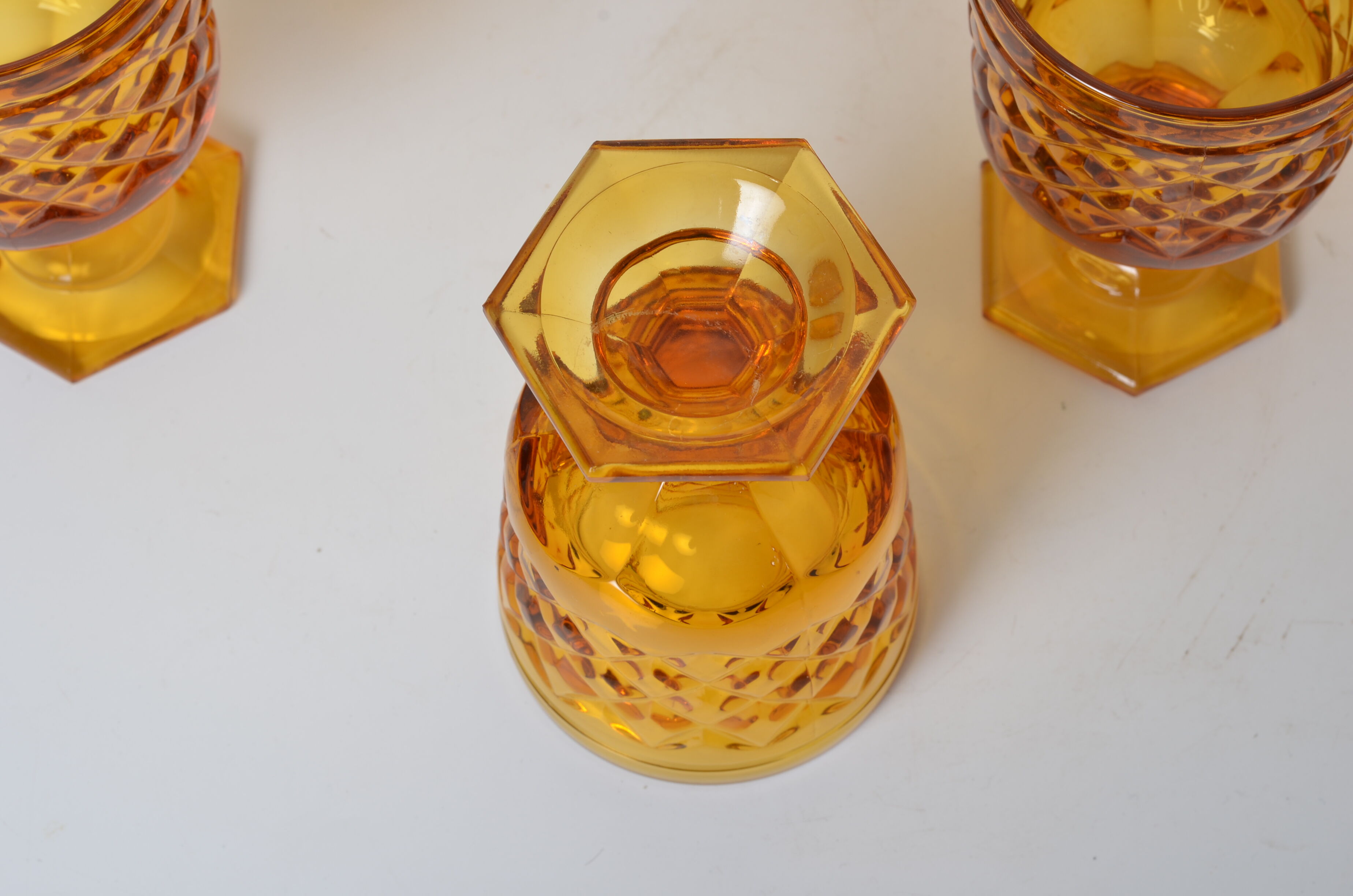 7 amber stemmed glasses