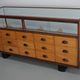 Antique British maple & hardwood haberdashery cabinet or shop counter, 1930s