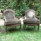 Pair of Louis XV style bergères in moulded and carved wood.
