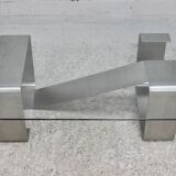 Coffee table with "kinetic" steel base and glass slab. Circa 1970.