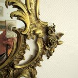 Louis XV style mirror, with bronze frame.