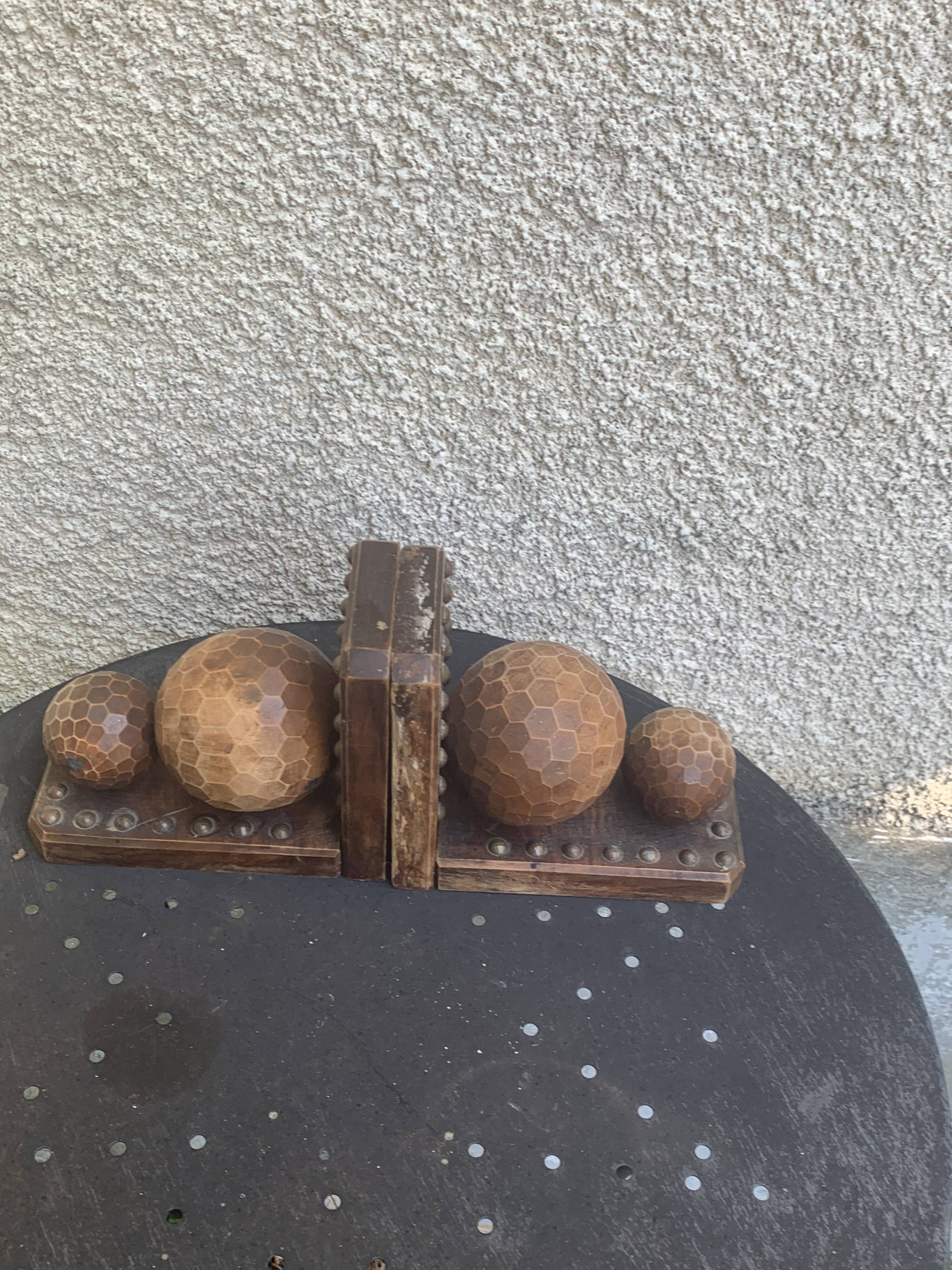 Pair of vintage carved wood and metal ball bookends