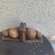 Pair of vintage carved wood and metal ball bookends