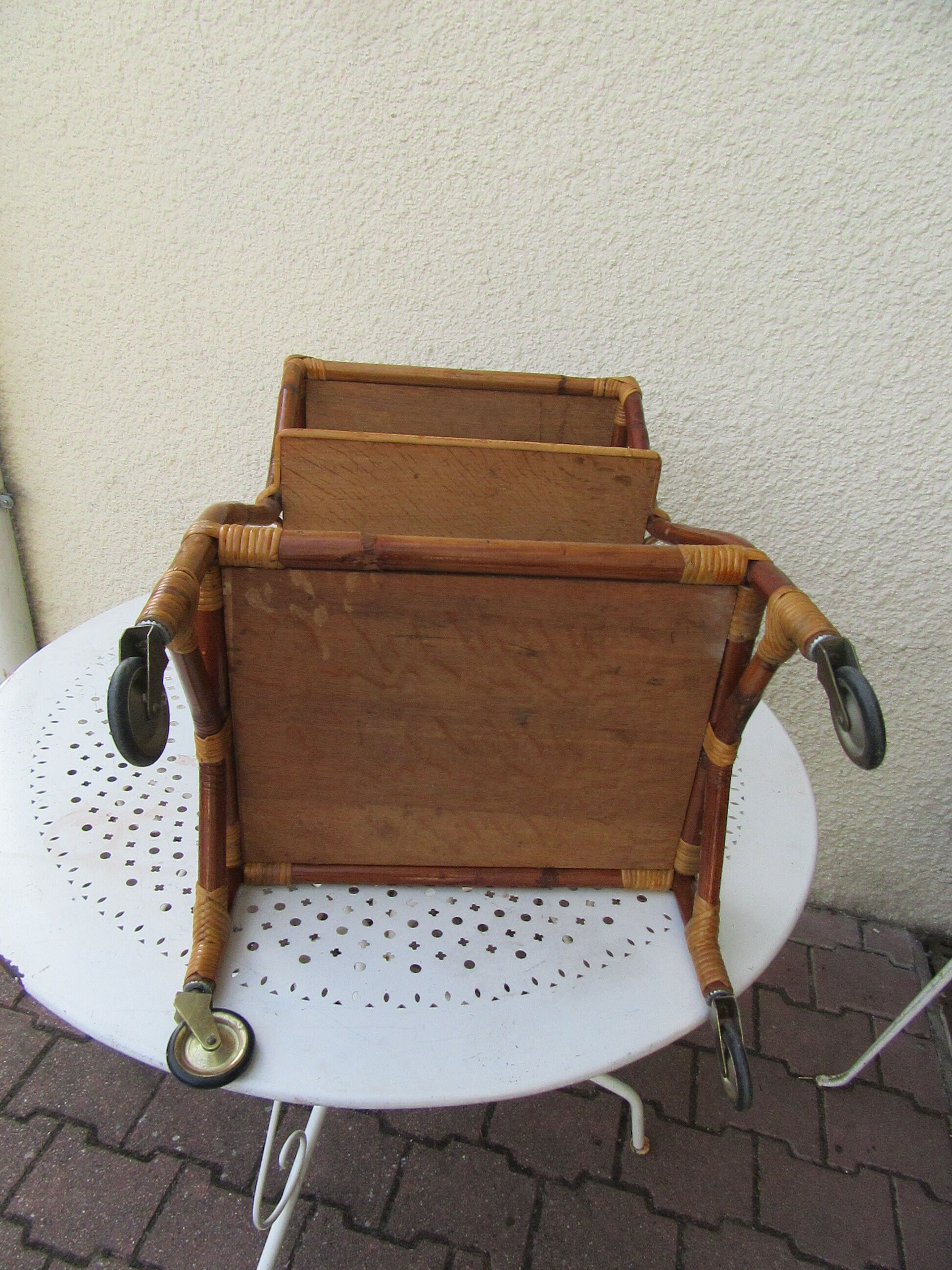 Rattan trolley on castors
