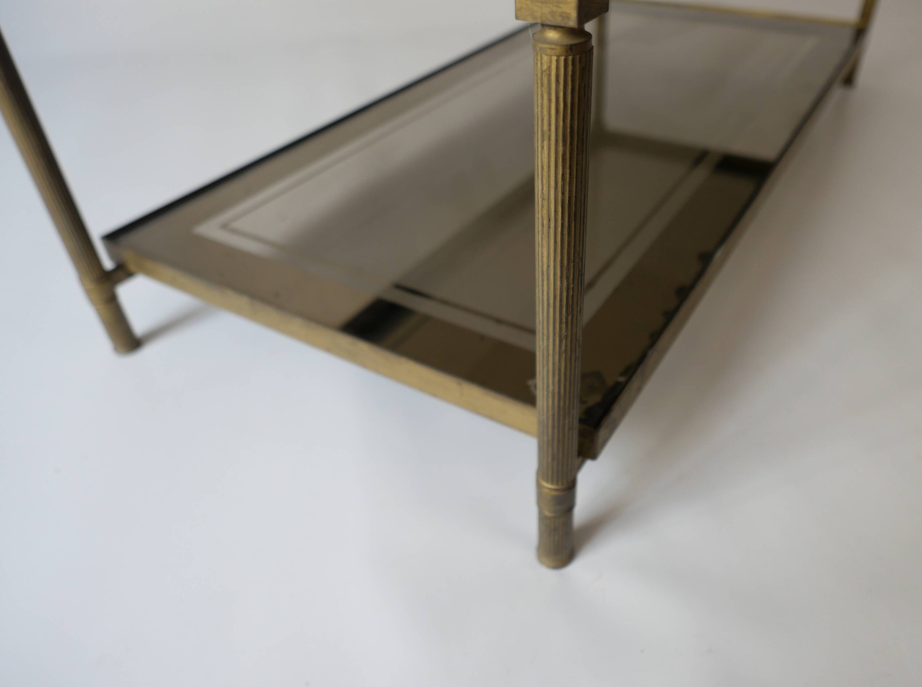 vintage brass coffee table with smoked glass mirror, antique Maison Jansen
