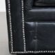 Black cowhide leather chesterfield armchair