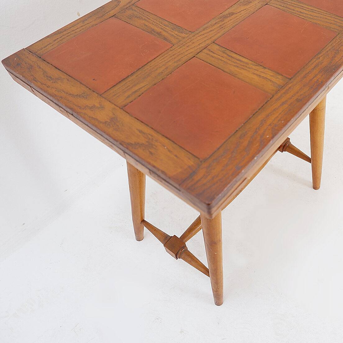 Vintage wooden side table with terracotta top