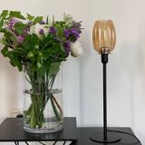 Table lamp with a vintage iridescent amber glass shade