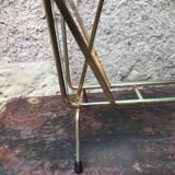 Glass and gold metal magazine door