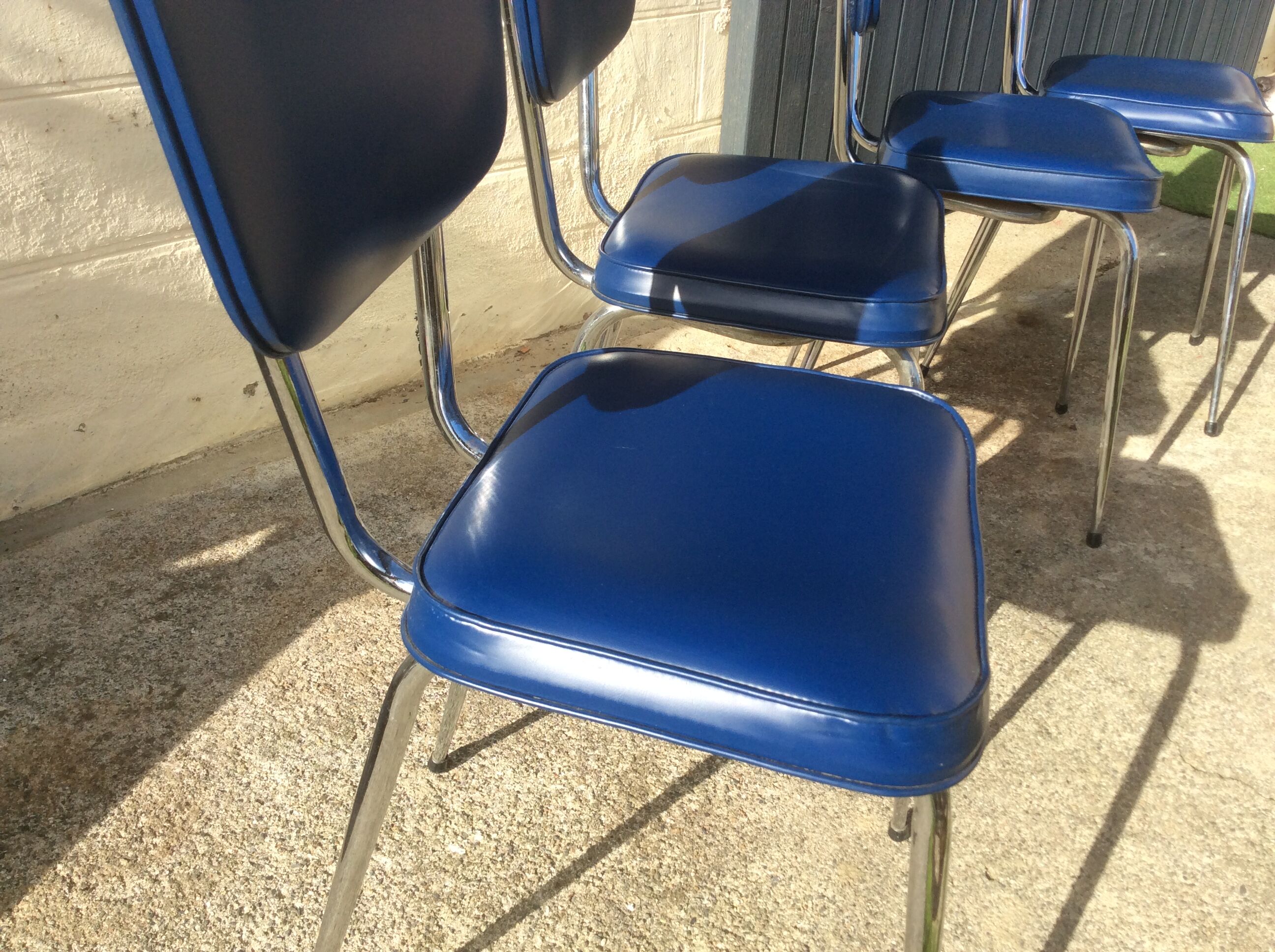Lot from 4 vintage chairs in skai