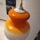 Pendant light in orange and white opaline