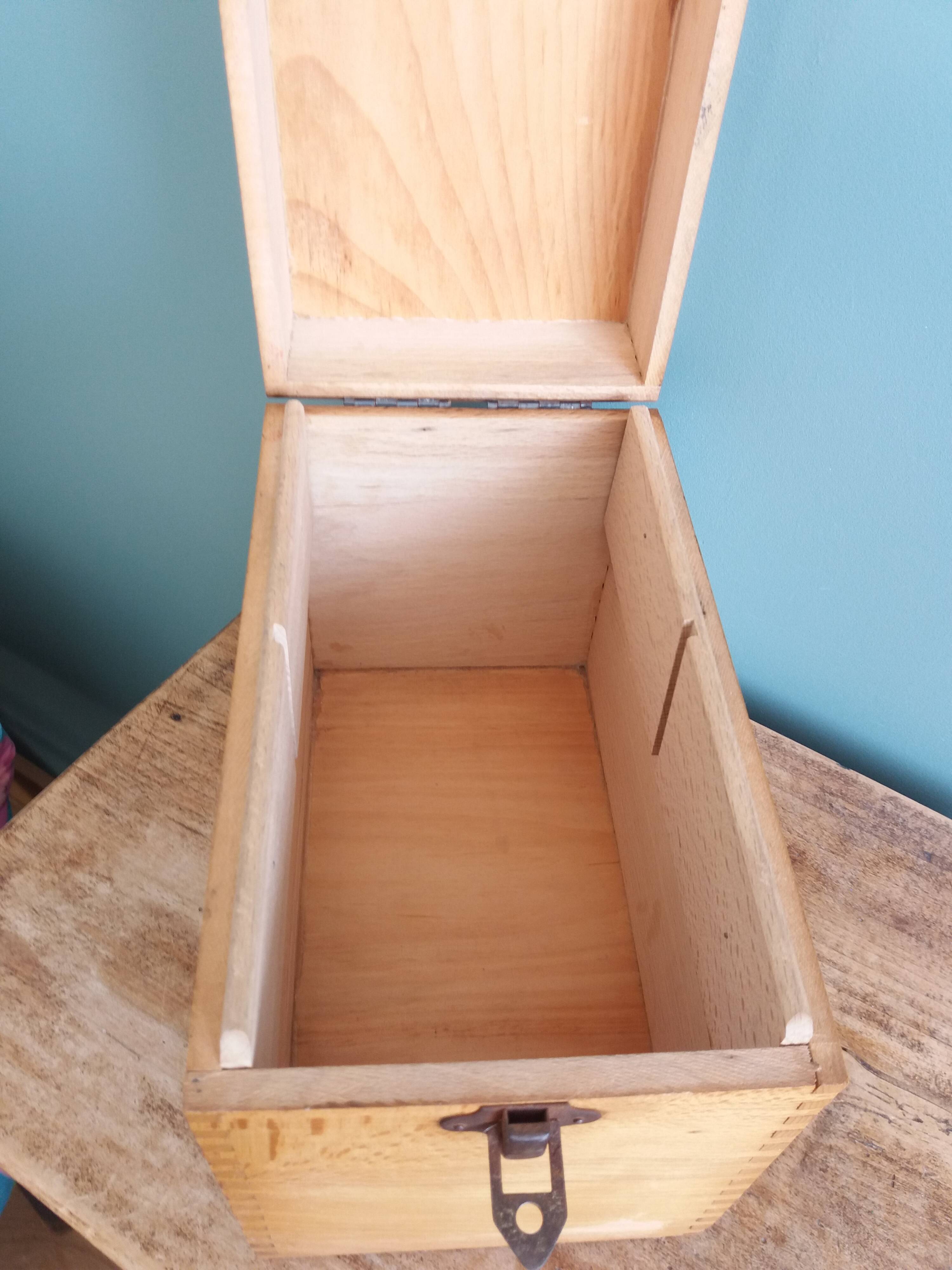 Wooden storage box, empty pocket