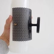 Set of four wall lights in white plexiglass and perforated black metal.