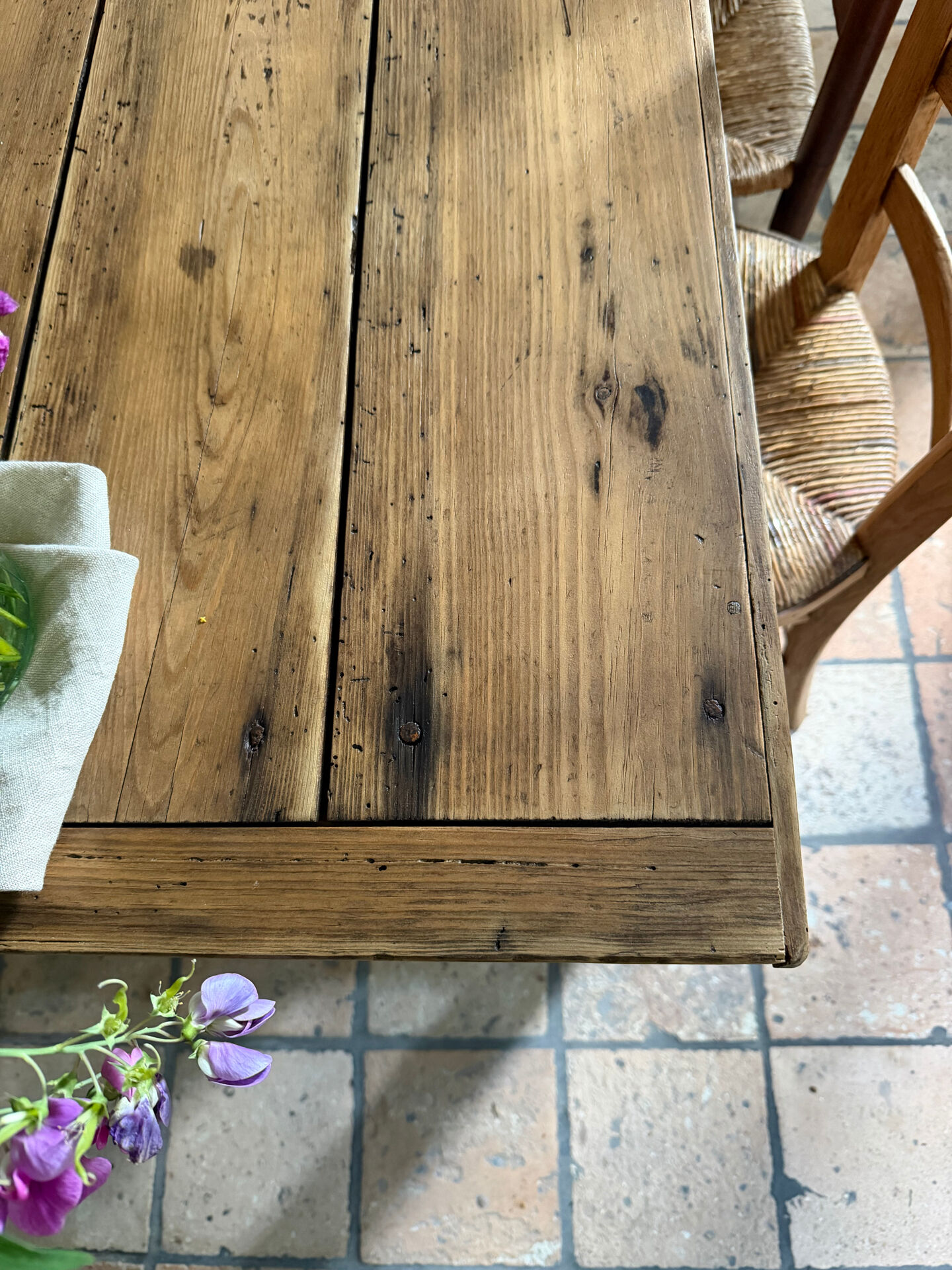 Renovated raw wood farmhouse table