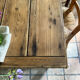Renovated raw wood farmhouse table