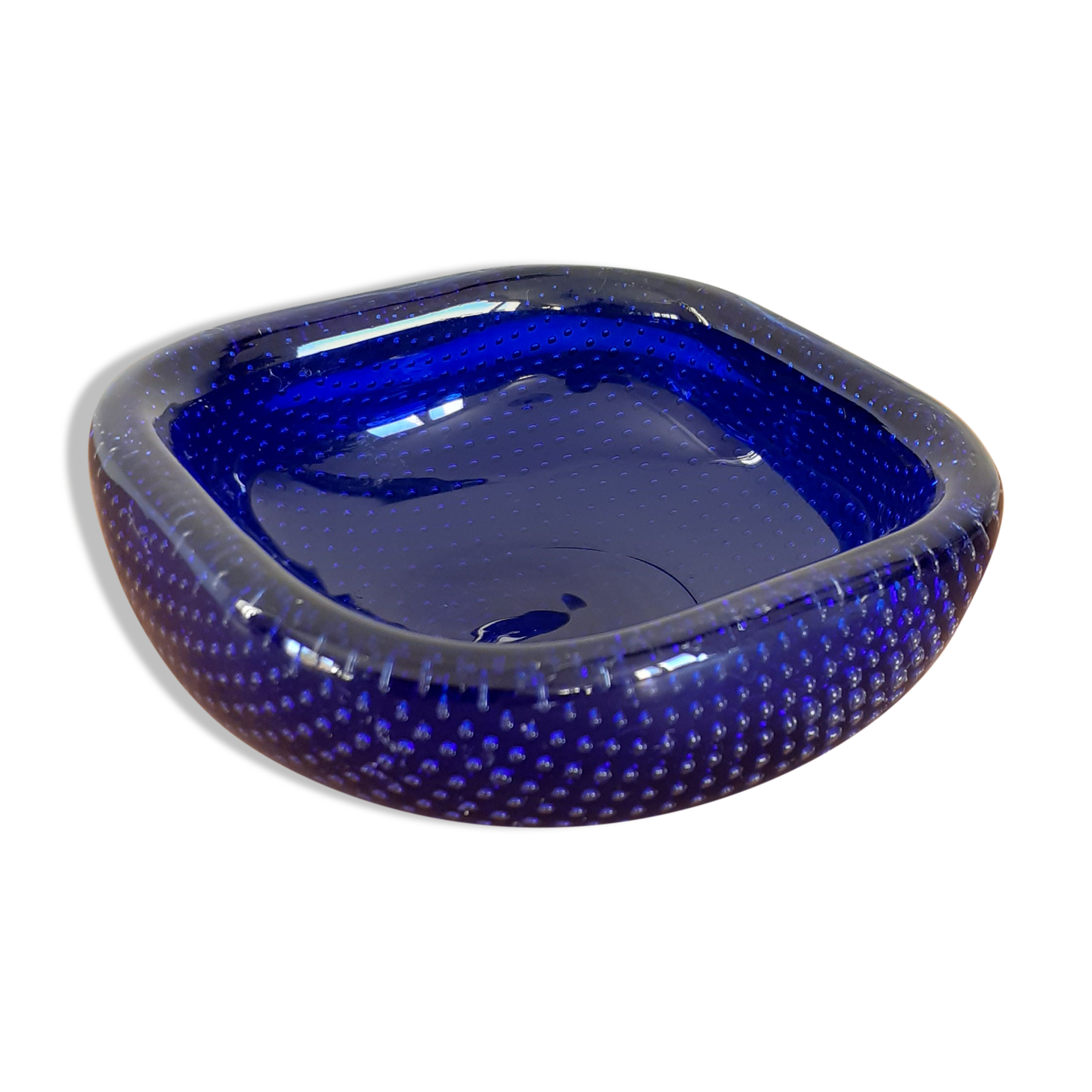 Empty blue bubbled glass pocket