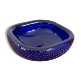 Empty blue bubbled glass pocket