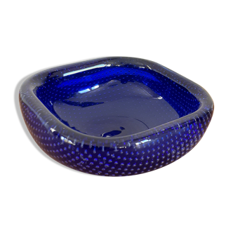 Empty blue bubbled glass pocket