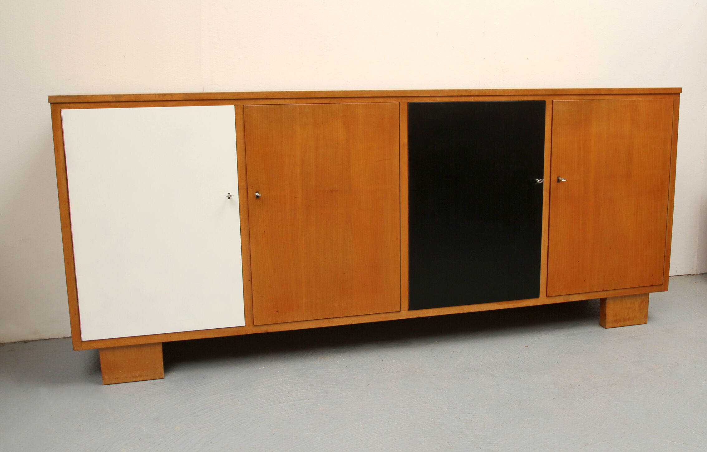 Sideboard in cherrywood with black and white doors 1950s