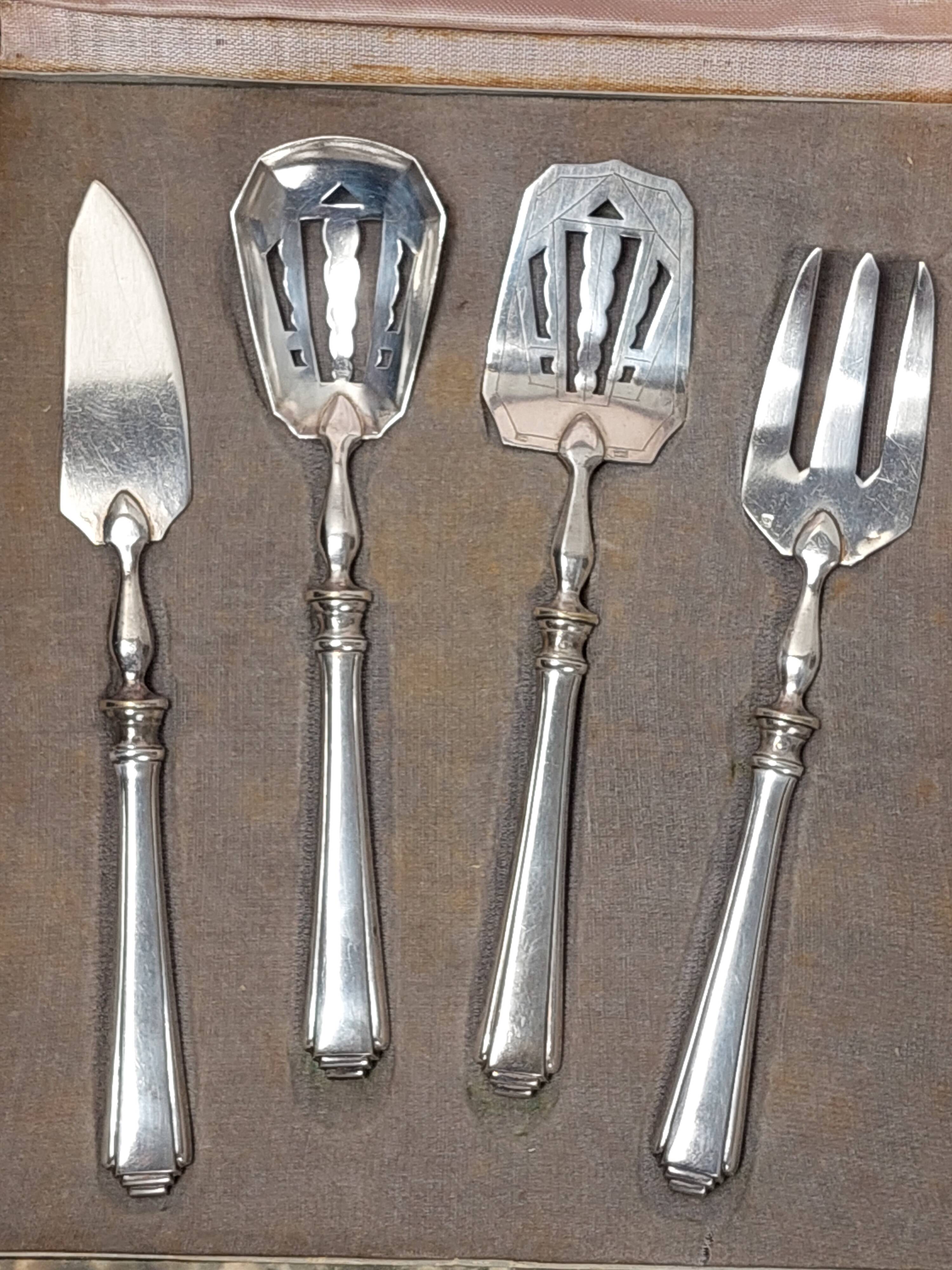 Set of dessert cutlery + 2 sugar tongs