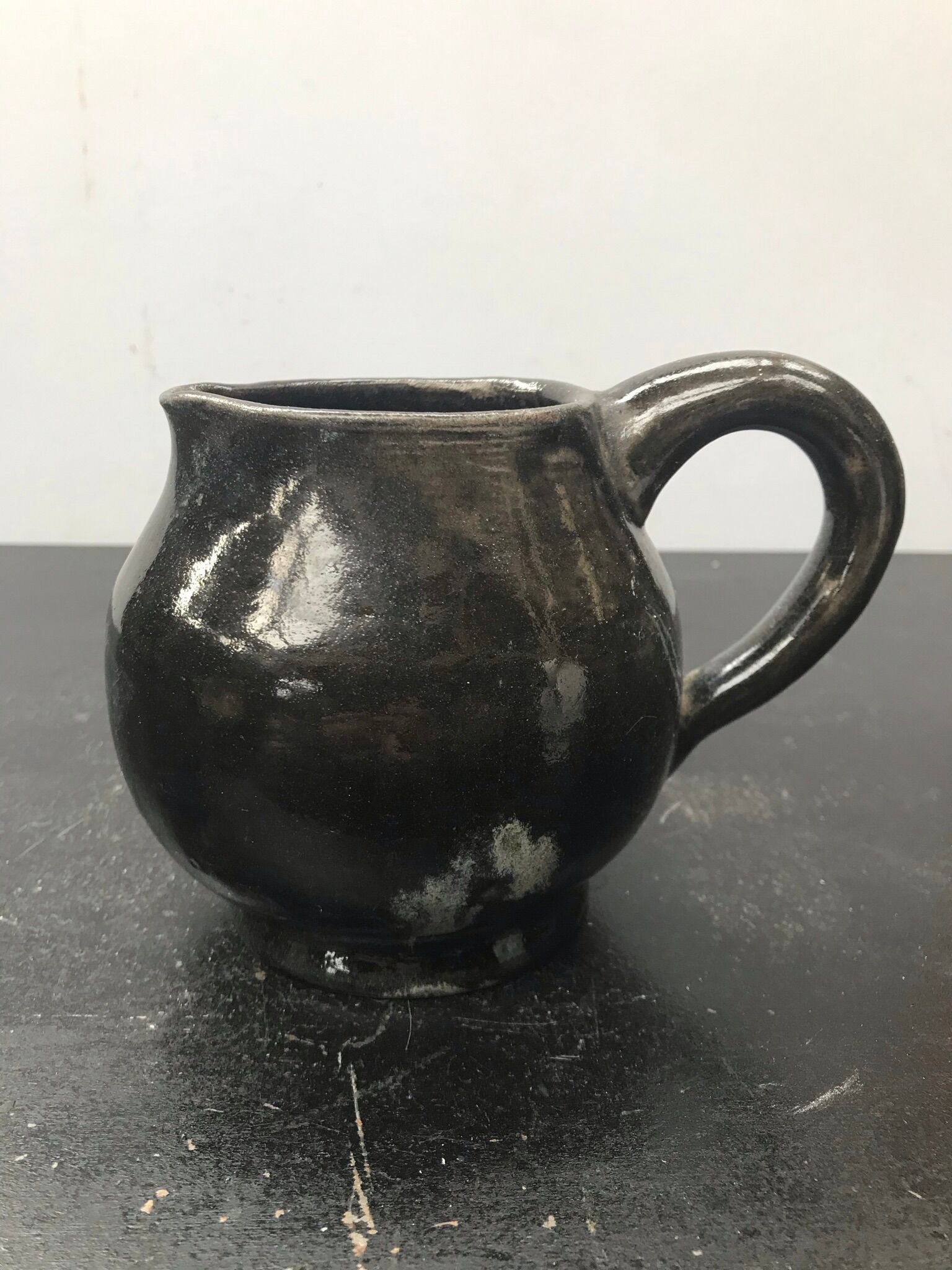Former black ceramics pitcher 70