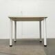 Postmodern Italian vintage dining table with terrazzo-style surface, 1980s.