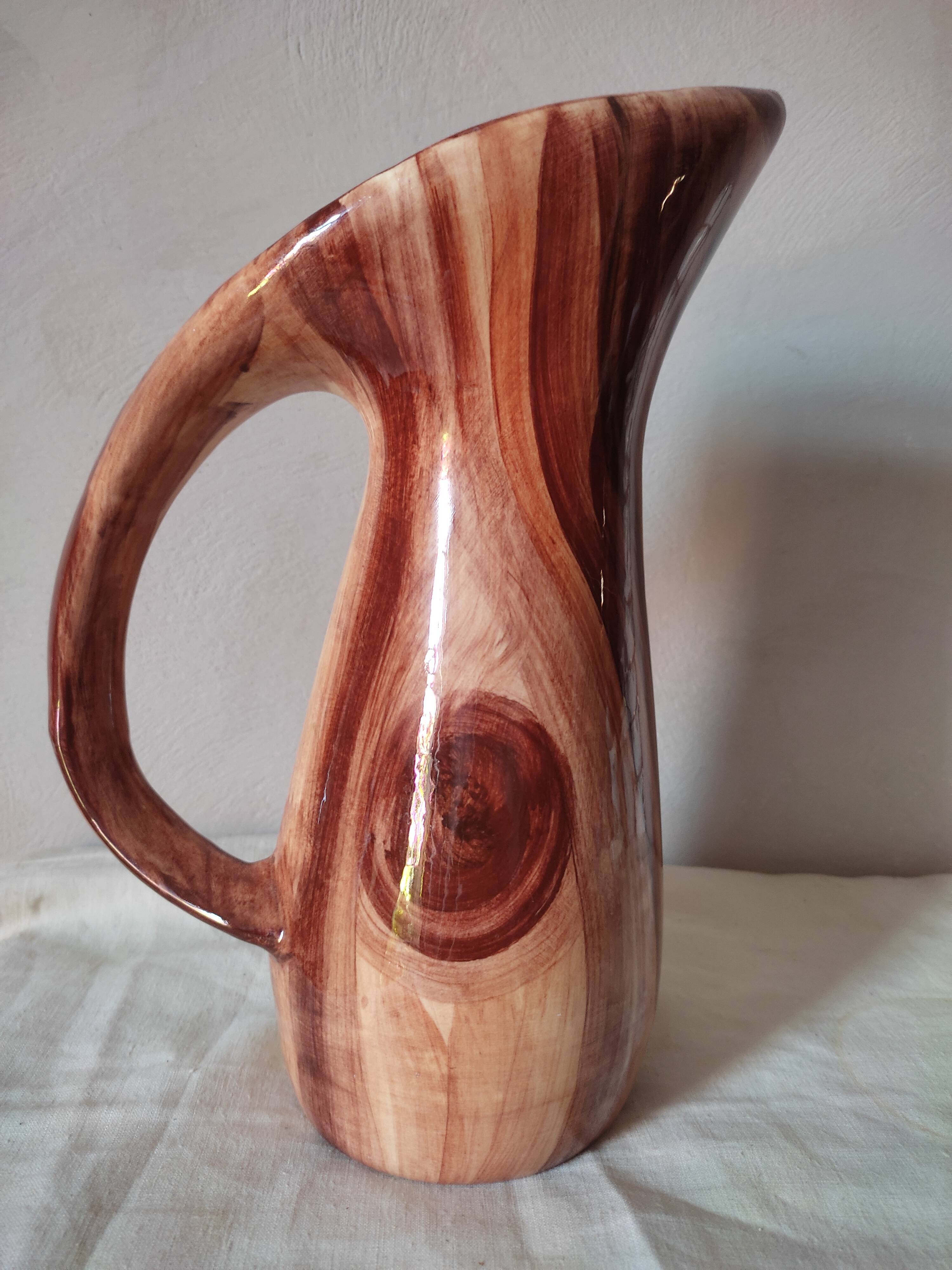 Earthenware decanter in false wood