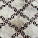 Tapis blanc cassé