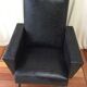 Fauteuil en Skaï noir vintage 50/60