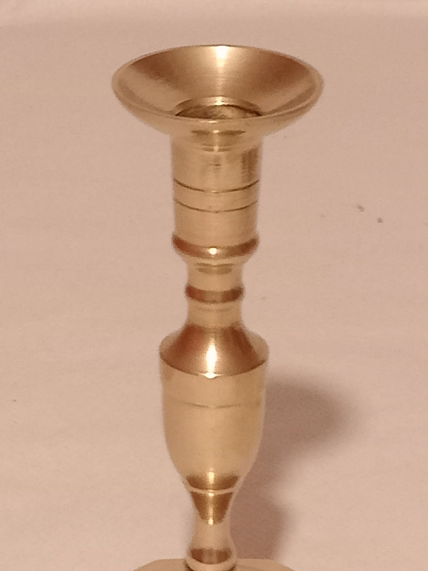 Pair of brass candle holders from the 50s