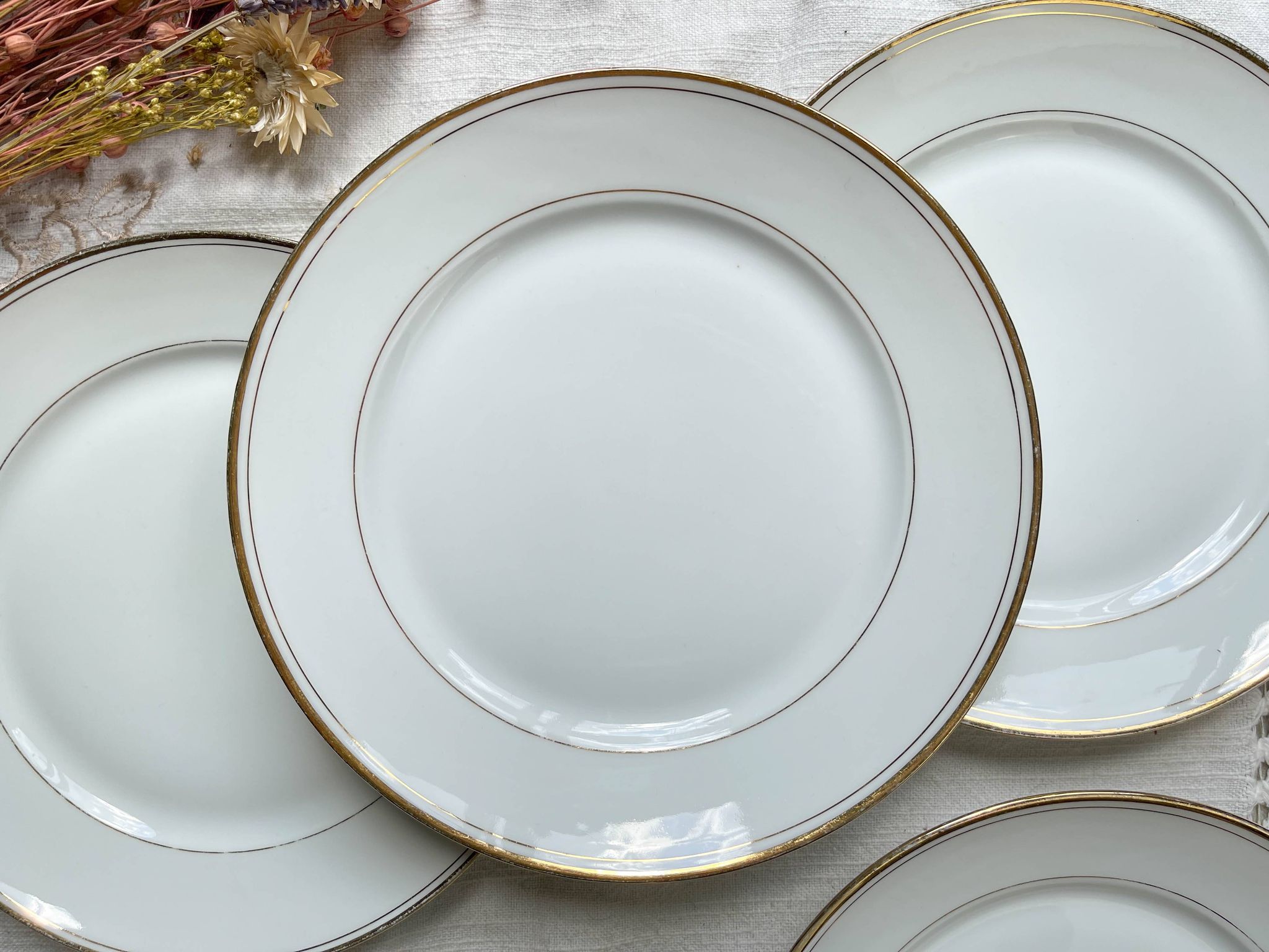 6 Small vintage French plates in golden white Limoges porcelain