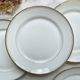 6 Small vintage French plates in golden white Limoges porcelain