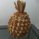Trash in the form of the pineapple in natural fibers